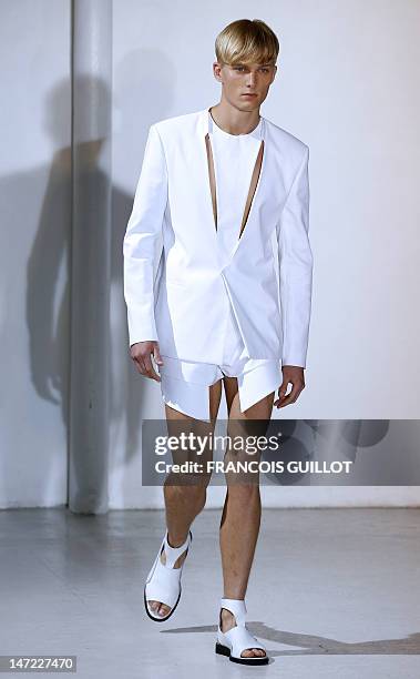 Model displays creations by Japanese-Italian designer Nicola Formichetti and collection designer Sebastien Teigne for the label Mugler during the...