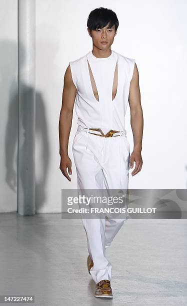 Model displays creations by Japanese-Italian designer Nicola Formichetti and collection designer Sebastien Teigne for the label Mugler during the...