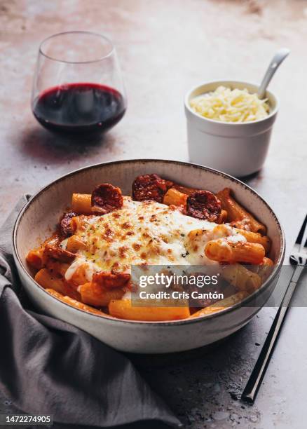 rigatoni with chorizo and bechamel - bechamel sauce stock pictures, royalty-free photos & images