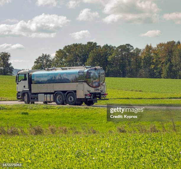 cargo lorry delivering goods  milk truck - oil tank stock-fotos und bilder