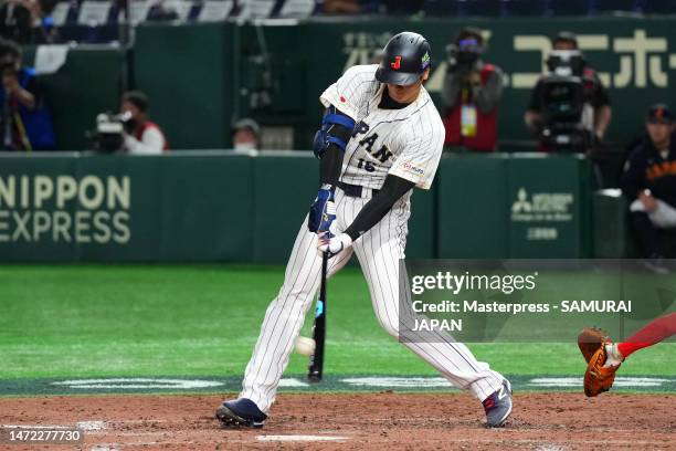 Shohei Ohtani of Japan hits a two-run double to make it 0-3 in the fourth inning during the World Baseball Classic Pool B game between China and...