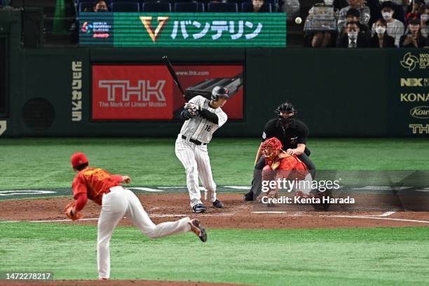 Shohei Ohtani of Japan hits a two-run double to make it 0-3 in the fourth inning during the World Baseball Classic Pool B game between China and...