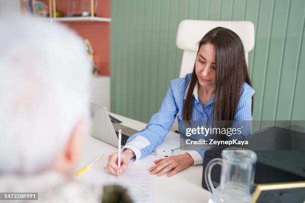 dietician seeing a senior patient at the clinic. - general view stock pictures, royalty-free photos & images