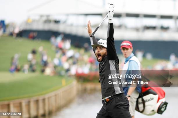 Hayden Buckley of the United States celebrates making a hole-in-one on the 17th hole during the first round of THE PLAYERS Championship on THE...