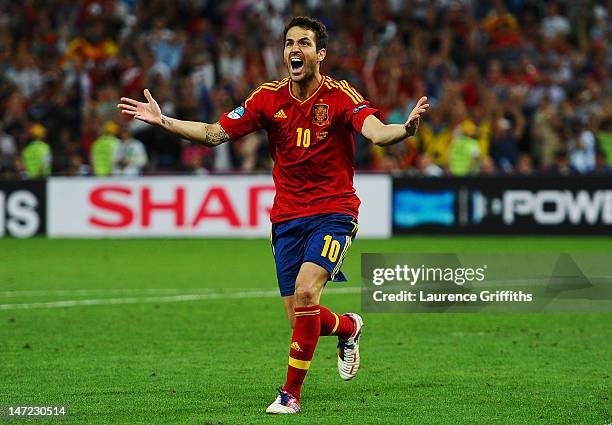 Cesc Fabregas of Spain celebrates scoring the winning penalty during the UEFA EURO 2012 semi final match between Portugal and Spain at Donbass Arena...