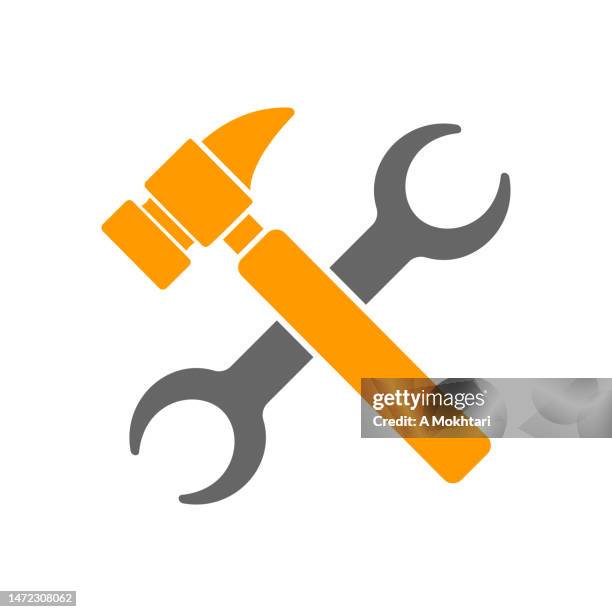 hammer and wrench icon on white background. - hammer wrench stock illustrations