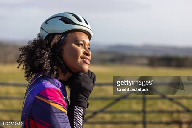 cyclist living actively - women resting stock pictures, royalty-free photos & images