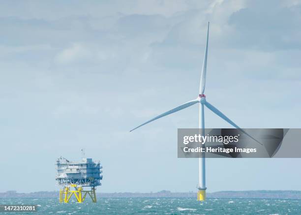 Westermost Rough Wind Farm, 2015. A view of the collector substation and a 6MW wind turbine at Westermost Rough Wind Farm, with the East Riding of...