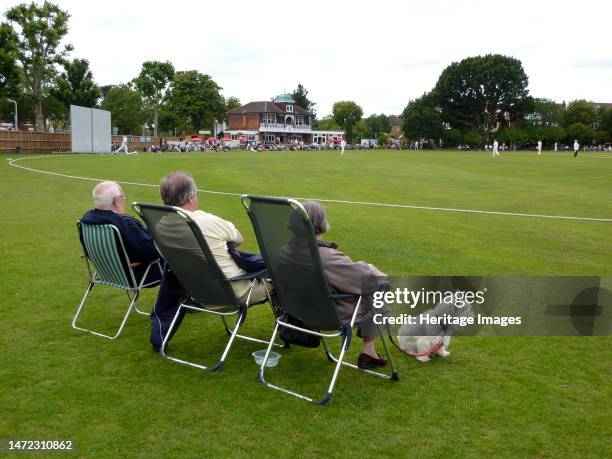 Ealing Cricket Club, Corfton Road, Ealing, Greater London Authority, 2009. Spectators with a dog watching a cricket match at Ealing Cricket Club on...