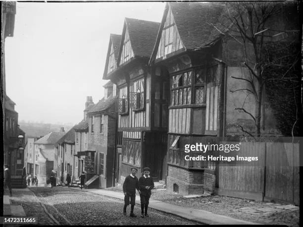 Hartshorn House, Mermaid Street, Rye, Rother, East Sussex, 1905. A view showing Hartshorn House on Mermaid Street with two boys standing in the...
