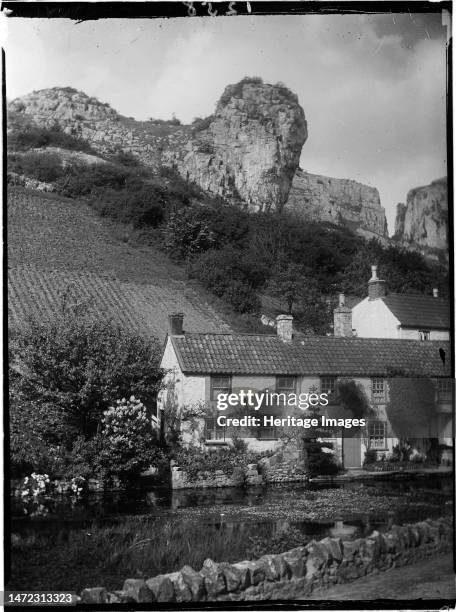 Mark Hole Cottage, The Cliffs, Cheddar, Sedgemoor, Somerset, 1907. Looking across the mill pond near Cox's Mill towards Mark Hole Cottage and Lion...