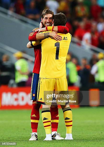Sergio Ramos and Iker Casillas of Spain celebrate victory during the UEFA EURO 2012 semi final match between Portugal and Spain at Donbass Arena on...