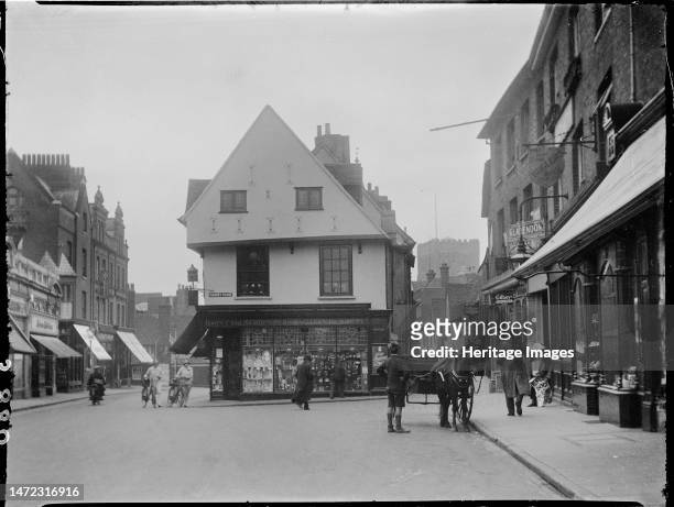 Market Place, St Albans, Hertfordshire, 1928. Looking south-west along the Market Place towards the north gable end of number 13 and the tower of St...