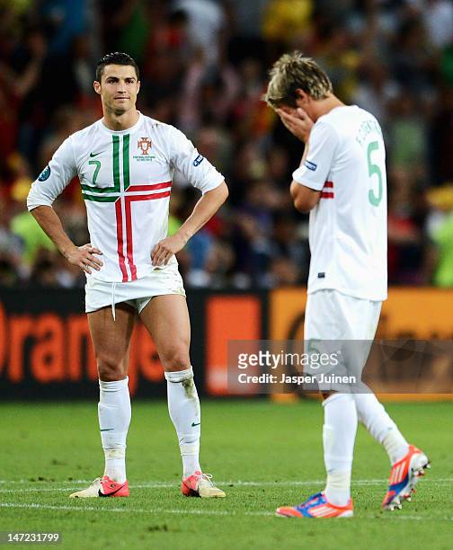 Cristiano Ronaldo of Portugal looks dejected after losing a penalty shoot out during the UEFA EURO 2012 semi final match between Portugal and Spain...