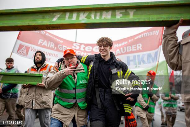 Steel workers from various local companies take part in demonstration to demand cheaper electricity for industry on March 09, 2023 in Duisburg,...
