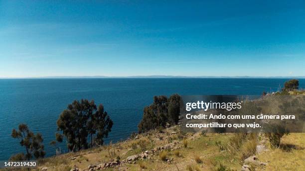 view of lake titicaca - câmera stock pictures, royalty-free photos & images