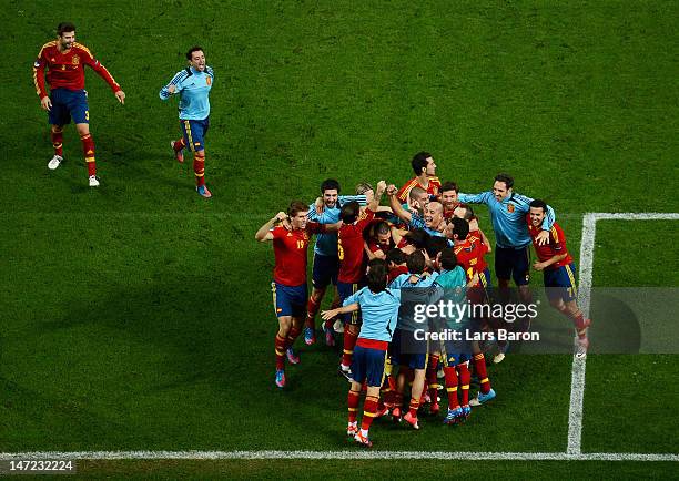 Spain players celebrate victory during the UEFA EURO 2012 semi final match between Portugal and Spain at Donbass Arena on June 27, 2012 in Donetsk,...