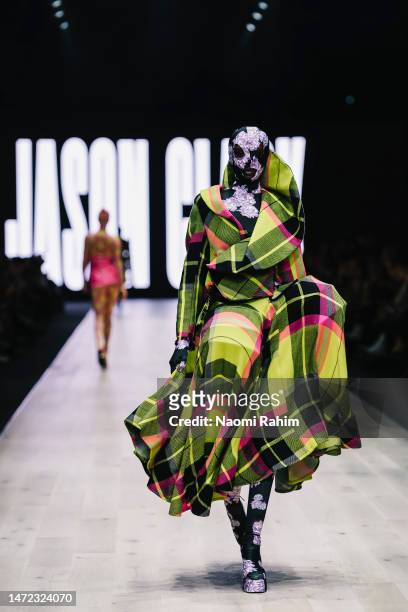 Model showcases designs by Jason Clark during the National Graduate Showcase at Melbourne Fashion Festival on March 09, 2023 in Melbourne, Australia.