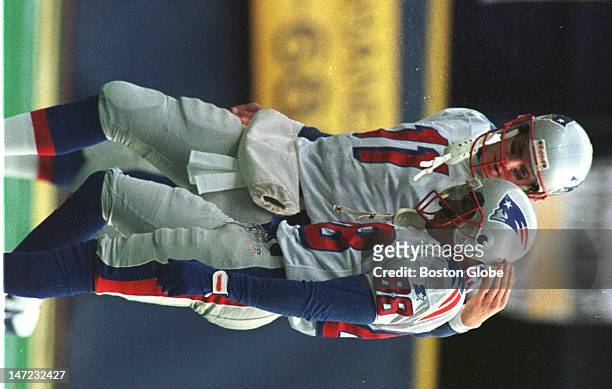 Patriots wide receiver Terry Glenn and Drew Bledsoe leave the field after a third down conversion miscommunication in the second half.