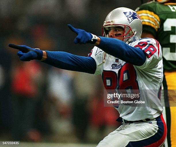 Patriots Terry Glenn reacts after catching a pass.