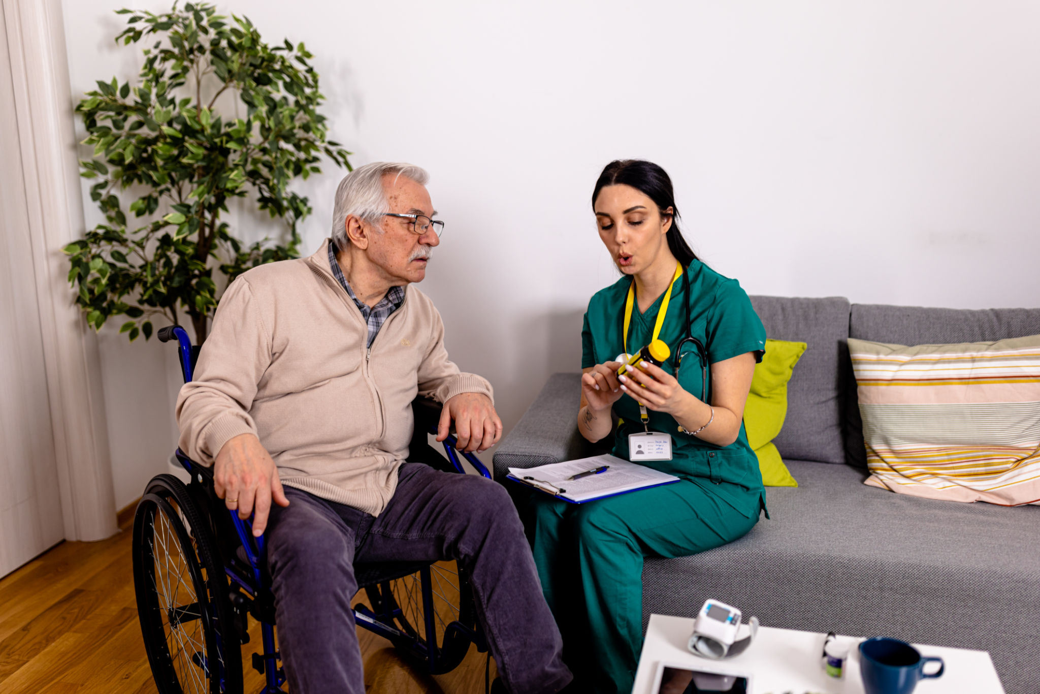Elderly Man Receives Much-Needed Medication from Caring Volunteer Elderly Man Receives Much-Needed Medication from Caring Volunteer