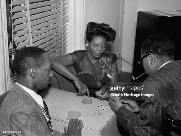 Portrait of Tadd Dameron, Mary Lou Williams, and Dizzy Gillespie, Mary Lou Williams' apartment, New York, N.Y., ca. Aug. 1947. Creator: William Paul...