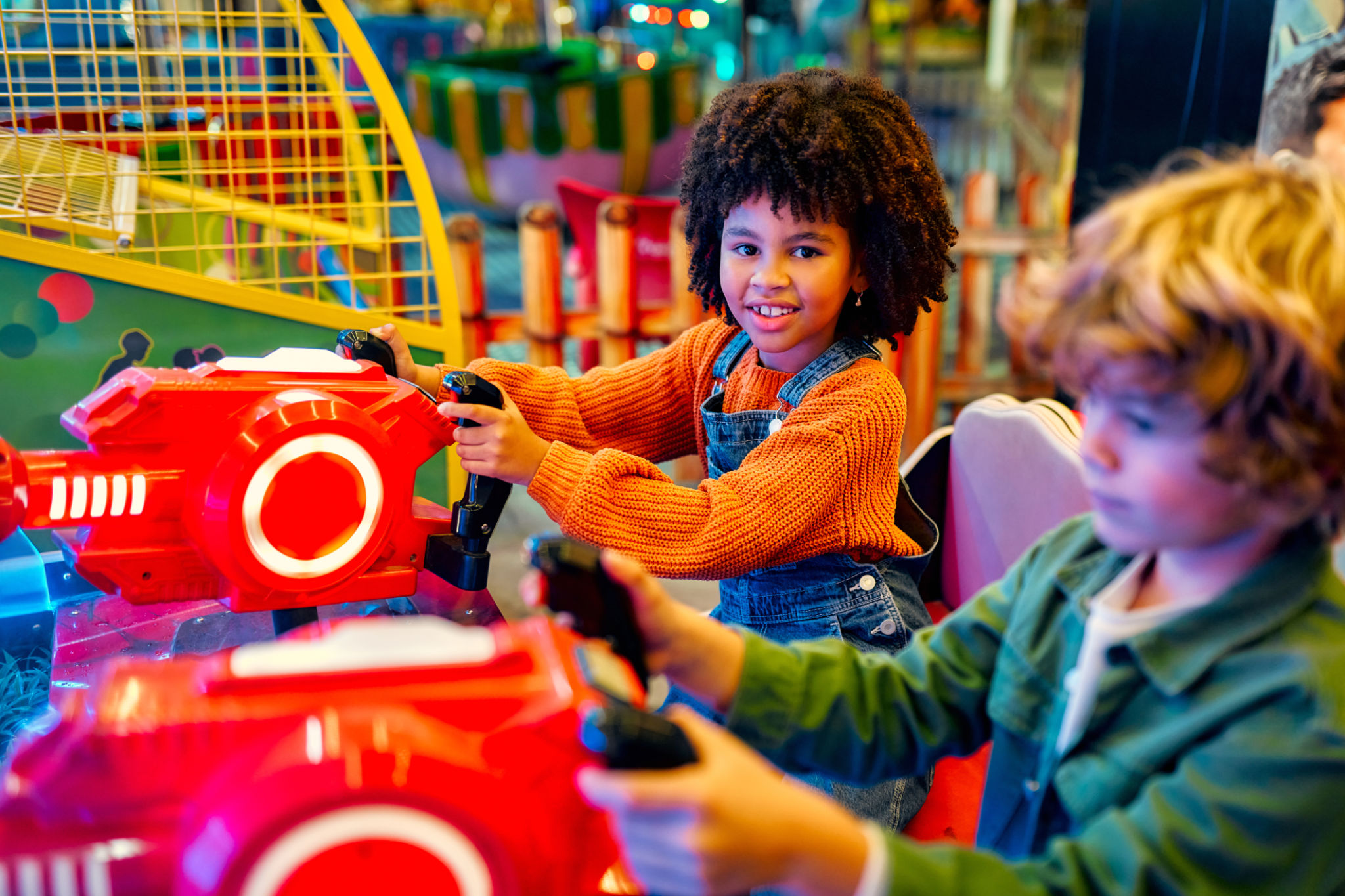 Kids having fun on a carnival Carousel Kids having fun on a carnival Carousel