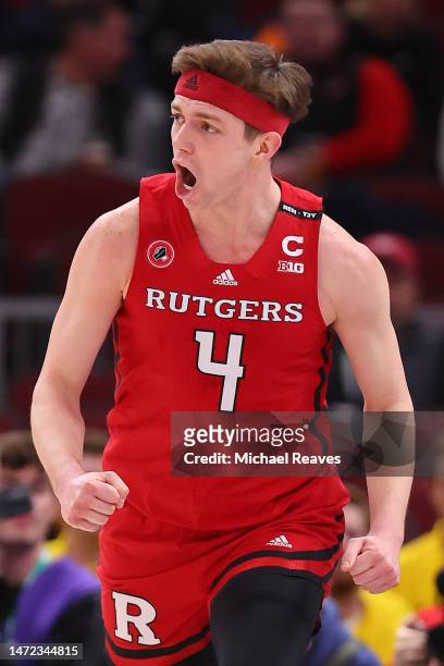 Paul Mulcahy of the Rutgers Scarlet Knights celebrates a basket against the Michigan Wolverines in the first half of the second round of the Big Ten...