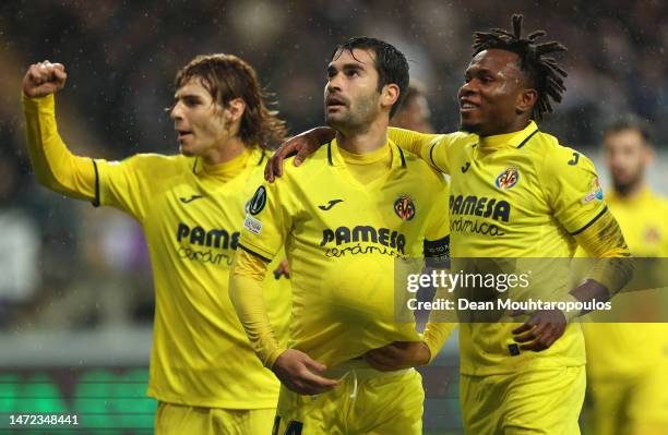 Manu Trigueros of Villarreal CF celebrates with teammate Samuel Chukwueze after scoring the team's first goal during the UEFA Europa Conference...