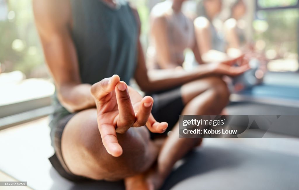 Hands, yoga class and meditation for peace, spiritual wellness or zen workout together on mat. Hand of yogi meditating for calm peaceful wellbeing, mental health and relax for mind or body exercise