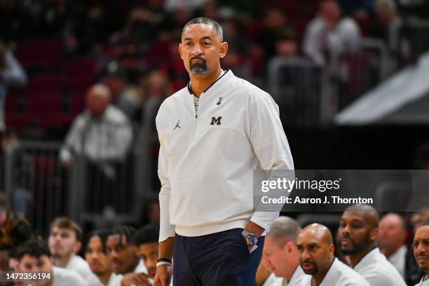 Head Basketball Coach Juwan Howard watches a play during the first half of a Big Ten Men's Basketball Tournament Second Round game against the...