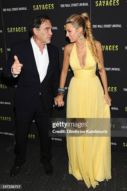 Director Oliver Stone and Actress Blake Lively attend the "Savages" New York premiere at SVA Theater on June 27, 2012 in New York City.