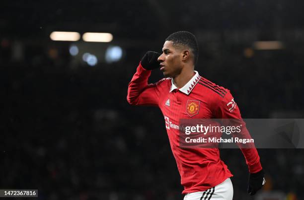 Marcus Rashford of Manchester United celebrates after scoring the team's first goal during the UEFA Europa League round of 16 leg one match between...