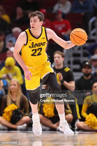 Patrick McCaffery of the Iowa Hawkeyes dribbles against the Ohio State Buckeyes in the first half of the second round in the Big Ten Tournament at...