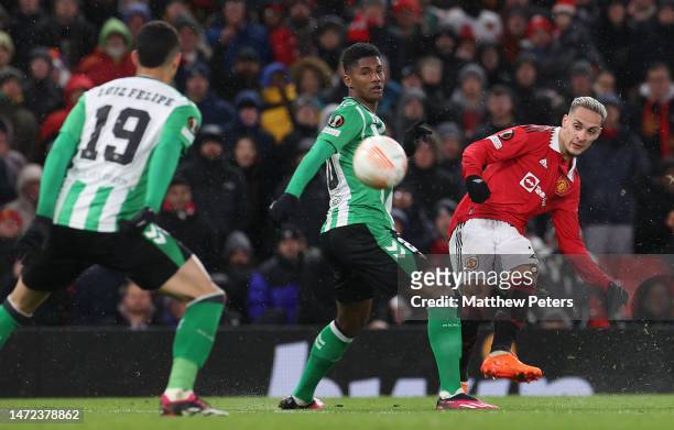 Antony of Manchester United scores their second goal during the UEFA Europa League round of 16 leg one match between Manchester United and Real Betis...