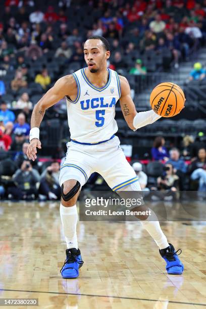 Amari Bailey of the UCLA Bruins handles the ball against Colorado Buffaloes in the first half of a quarterfinal game of the Pac-12 basketball...