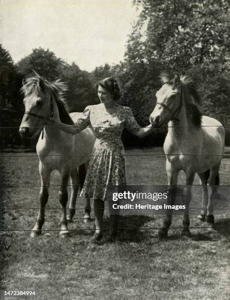 'High Spirits', 1947. Princess Elizabeth with two thorough-bred Norwegian dun ponies, bred by her father King George VI, at Windsor Castle. From...