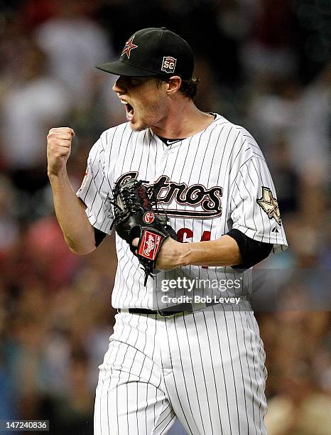 Lucas Harrell of the Houston Astros reacts after striking out Nick Hundley of the San Diego Padres in the ninth inning to end the game at Minute Maid...