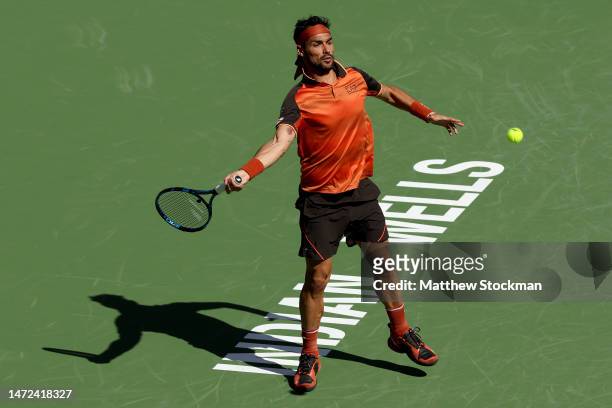 Fabio Fognini of Italy returns a shot to Ben Shelton during the BNP Paribas Open at the Indian Wells Tennis Garden on March 09, 2023 in Indian Wells,...