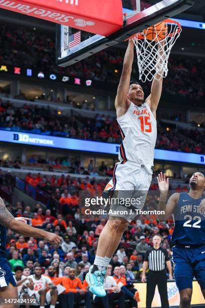 Melendez of the Illinois Fighting Illini dunks the ball during the second half of a Big Ten Men's Basketball Tournament Second Round game against the...