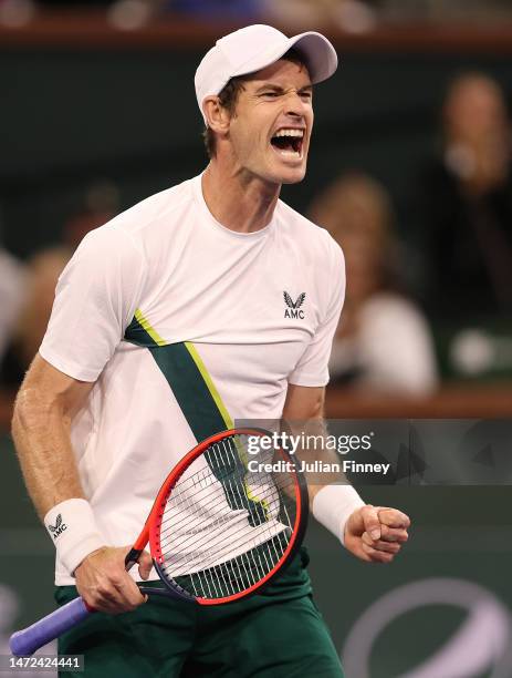 Andy Murray of Great Britain celebrates defeating Tomas Martin Etcheverry of Argentina during the BNP Paribas Open on March 09, 2023 in Indian Wells,...