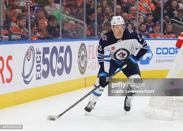 Karson Kuhlman of the Winnipeg Jets sets up behind the net in the second period against the Edmonton Oilers on March 3, 2023 at Rogers Place in...