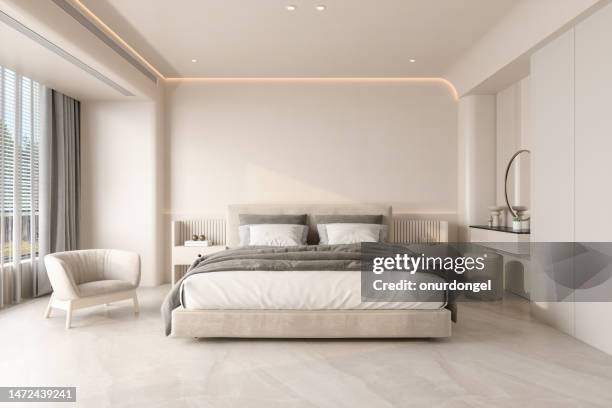 modern bedroom interior with double bed, armchair and night tables - empty apartment stock pictures, royalty-free photos & images