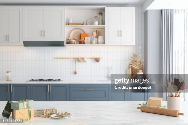 modern kitchen with homemade gingerbread cookies and gift boxes on kitchen counter.  baking and selling cookies - kitchen bench top stock pictures, royalty-free photos & images