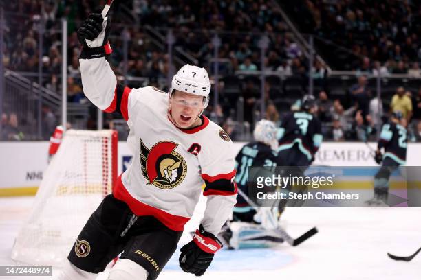 Brady Tkachuk of the Ottawa Senators celebrates a goal by Claude Giroux against the Seattle Kraken during the third period at Climate Pledge Arena on...