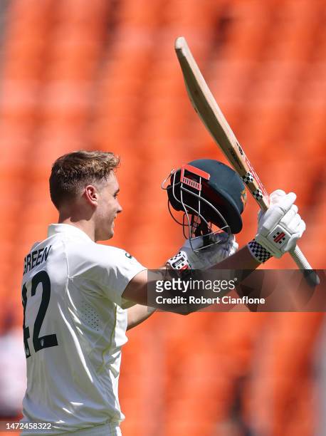 Cameron Green of Australia celebrates after scoring his century during day two of the Fourth Test match in the series between India and Australia at...