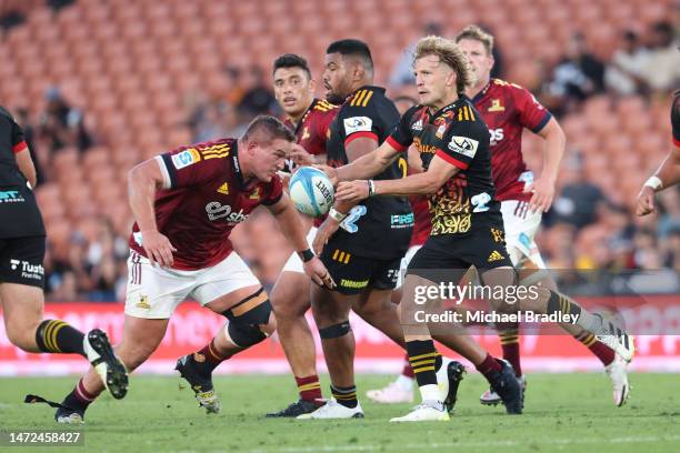 Damian McKenzie of the Chiefs passes the ball during the round three Super Rugby Pacific match between Chiefs and Highlanders at FMG Stadium Waikato,...