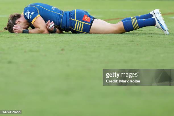 Clinton Gutherson of the Eels lies injured during the round two NRL match between the Parramatta Eels and the Cronulla Sharks at CommBank Stadium on...