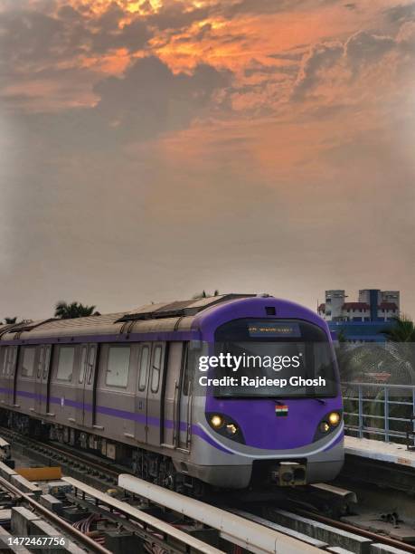 kolkata metro daily run during rush hours - railway tracks sunset stock pictures, royalty-free photos & images