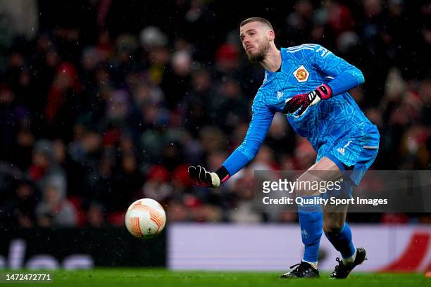 David de Gea of Manchester United passes the ball during the UEFA Europa League round of 16 leg one match between Manchester United and Real Betis at...